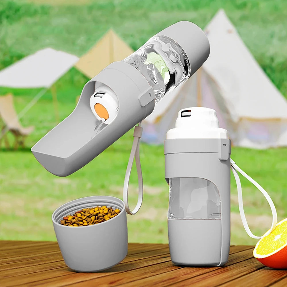 Botella de agua portátil para perros y gatos con almacenamiento de alimentos.