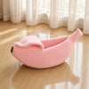 Cama Cálida con forma de plátano para mascotas.