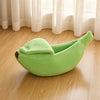 Cama Cálida con forma de plátano para mascotas.